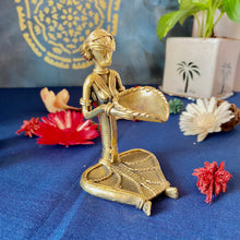 Load image into Gallery viewer, Dhokra tribal lady sitting with diya